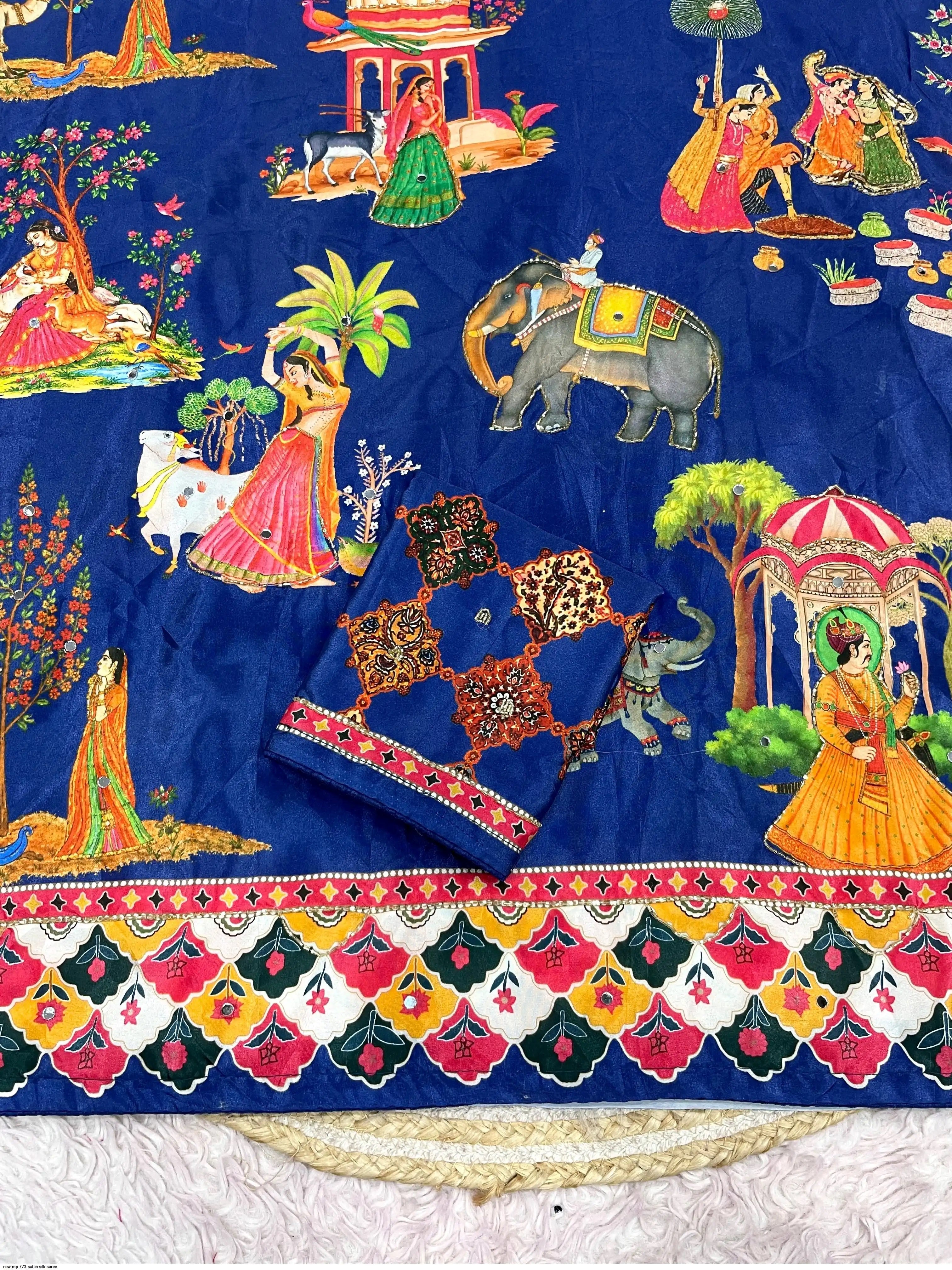 These Bollywood-style satin silk sarees feature vibrant Pichwai digital prints and  handwork