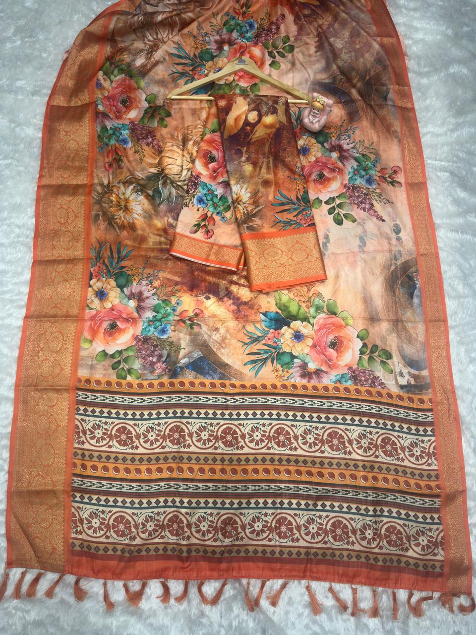 Soft Lichi Silk Saree adorned with elegant floral patterns and intricate Patola-inspired pallu, complemented by a luxurious zari woven border