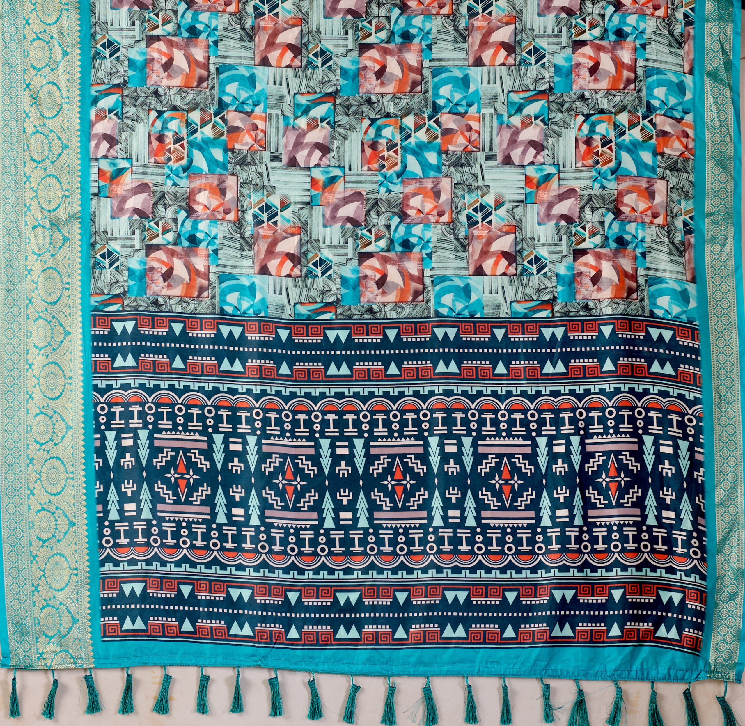 Premium Soft Lichi Silk Saree in Elegant Sea Green Shade, adorned with Artistic Abstract & Floral Digital Prints and enriched with a Luxurious Golden Zari Woven Border — a perfect blend of tradition and trend for festive & party occasions.