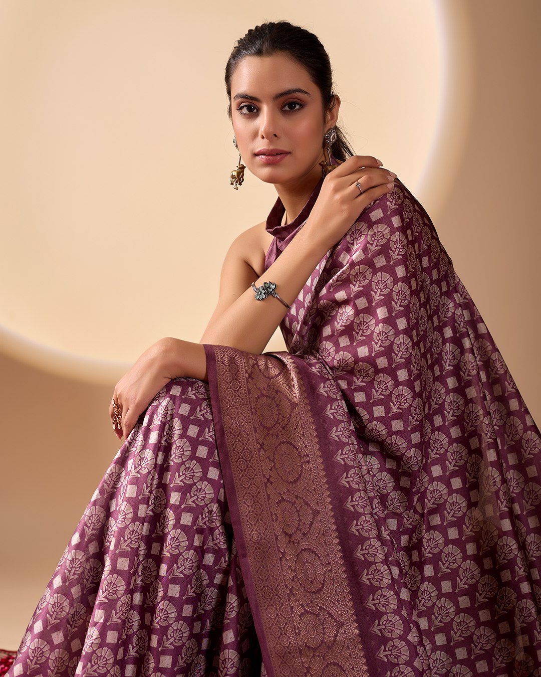 Regal Soft Lichi Silk Saree adorned with intricate digital ethnic weaving motifs and a luxurious golden zari border.