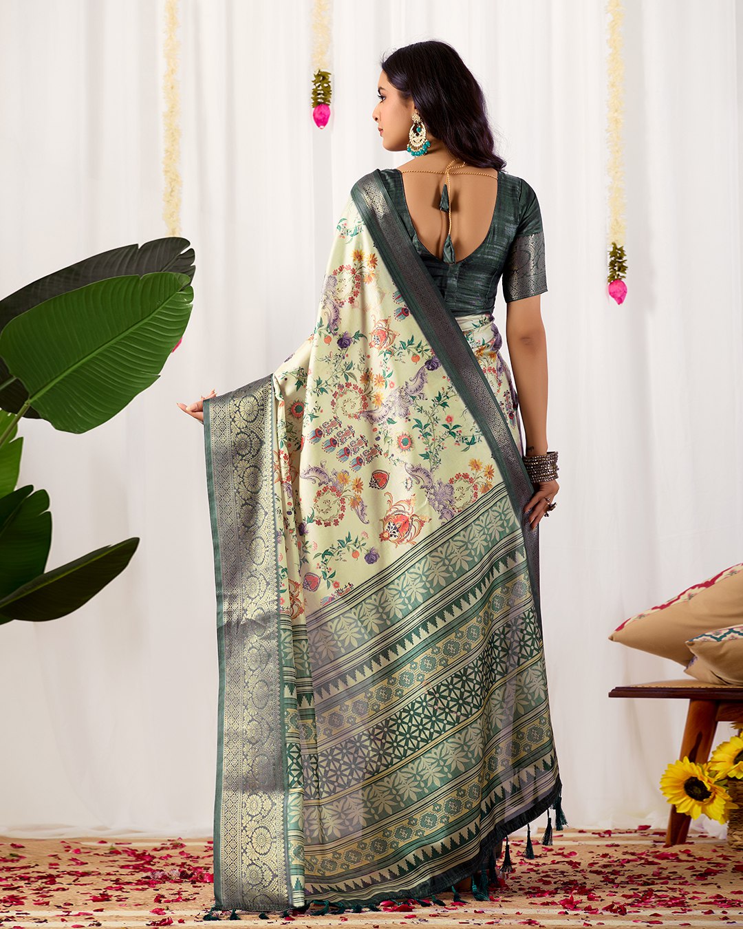 Premium Soft Lichi Silk Saree adorned with vibrant digital floral prints, complemented by a rich, intricately woven zari border — a perfect blend of luxury and tradition.