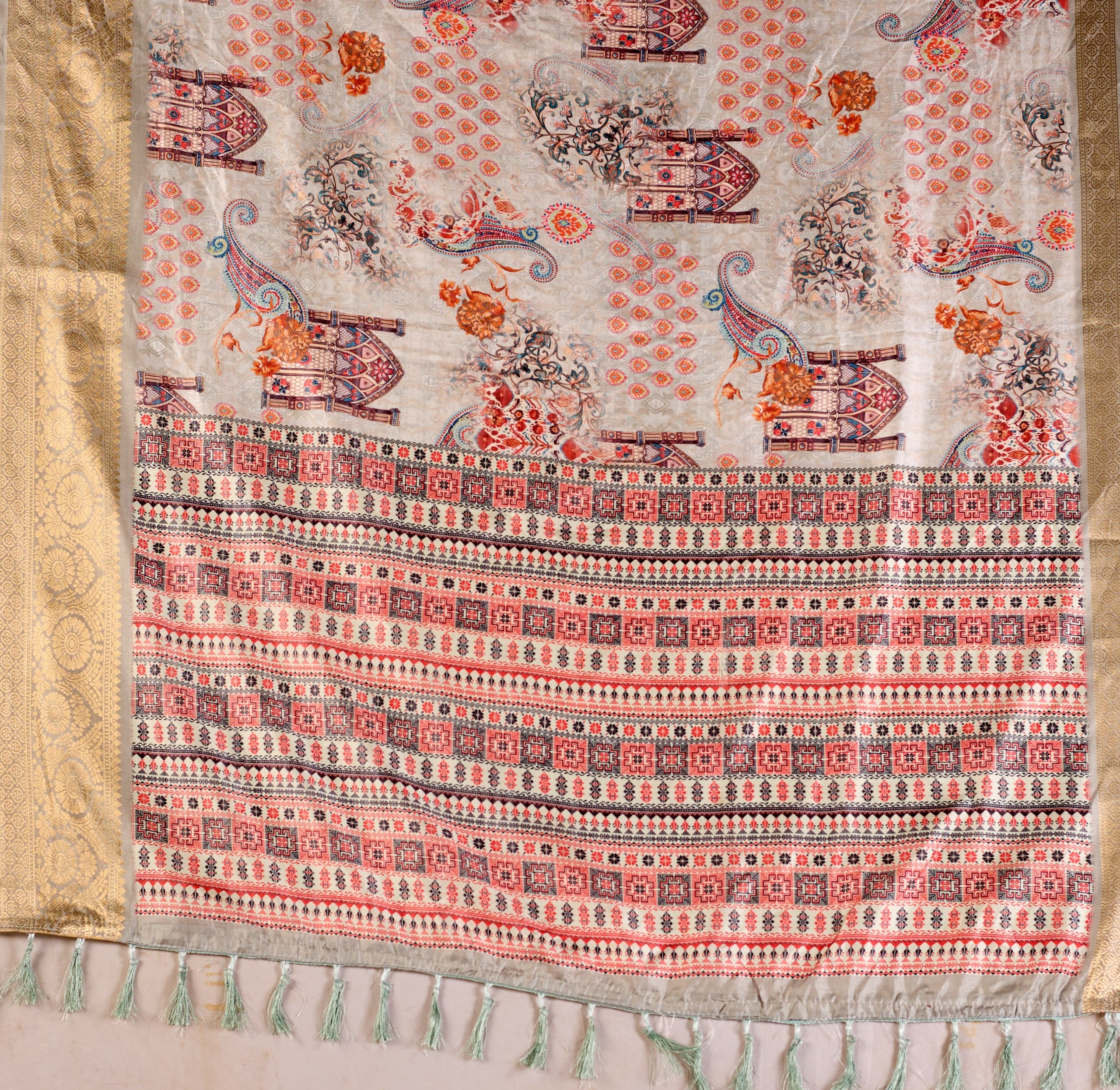 Elegant Soft Lichi Silk Saree featuring royal ethnic motifs with a lavish golden zari woven border, bringing together rich heritage and modern sophistication.