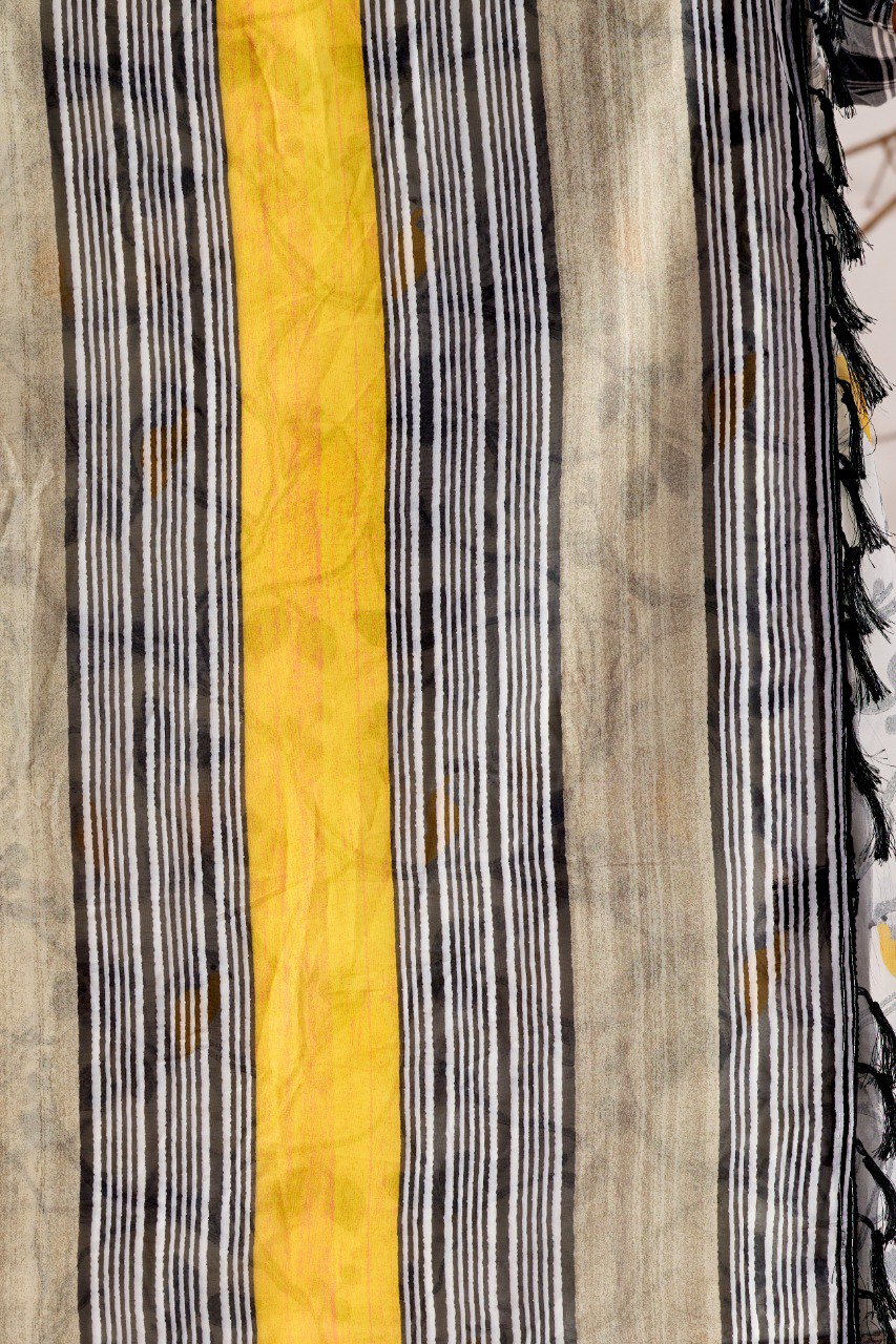 Soft Georgette Lightweight Saree with Delicate Cream Base, Adorned with Subtle Bird & Branch Motifs and Finished with Bold Mustard-Yellow & Black Striped Digital Print Border and Pallu with Elegant Tassel Detailing