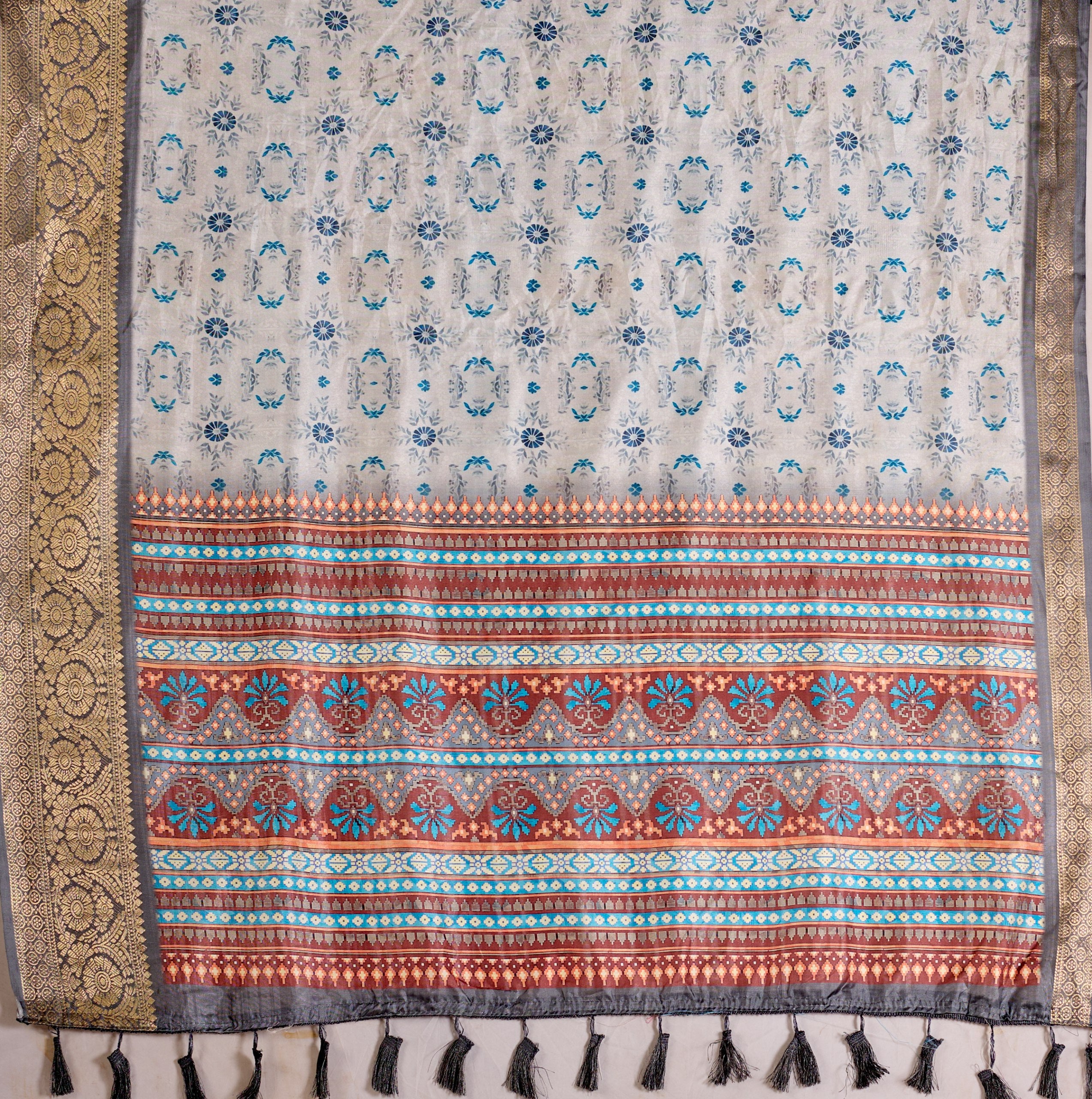 Premium Soft Lichi Silk Saree in Elegant Sea Green Shade, adorned with Artistic Abstract & Floral Digital Prints and enriched with a Luxurious Golden Zari Woven Border