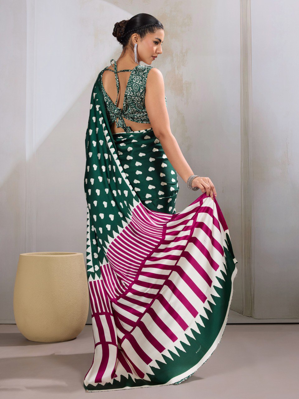 Pure Ajrakh modal satin fabric featuring traditional printed motifs with rich, earthy tones and a soft, breathable feel, perfect for all-day elegance.