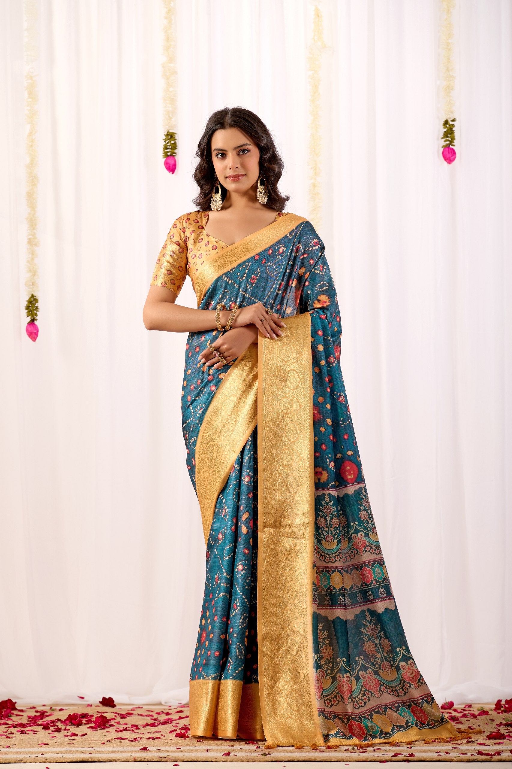 Soft Lichi Silk Saree featuring an Elegant Tribal Art Print complemented by a Luxurious Rich Zari Border. The blend of traditional artistry and silky sheen adds a royal touch to your festive look.