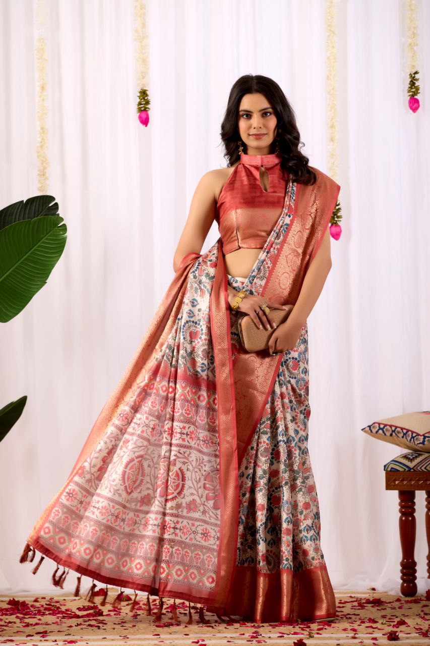 Premium Soft Lichi Silk Saree with elegant Patola-inspired geometric prints beautifully crafted with a luxurious zari woven border.