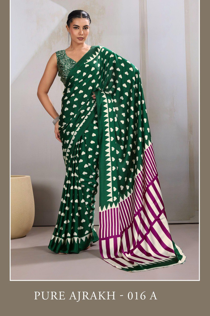Pure Ajrakh modal satin fabric featuring traditional printed motifs with rich, earthy tones and a soft, breathable feel, perfect for all-day elegance.