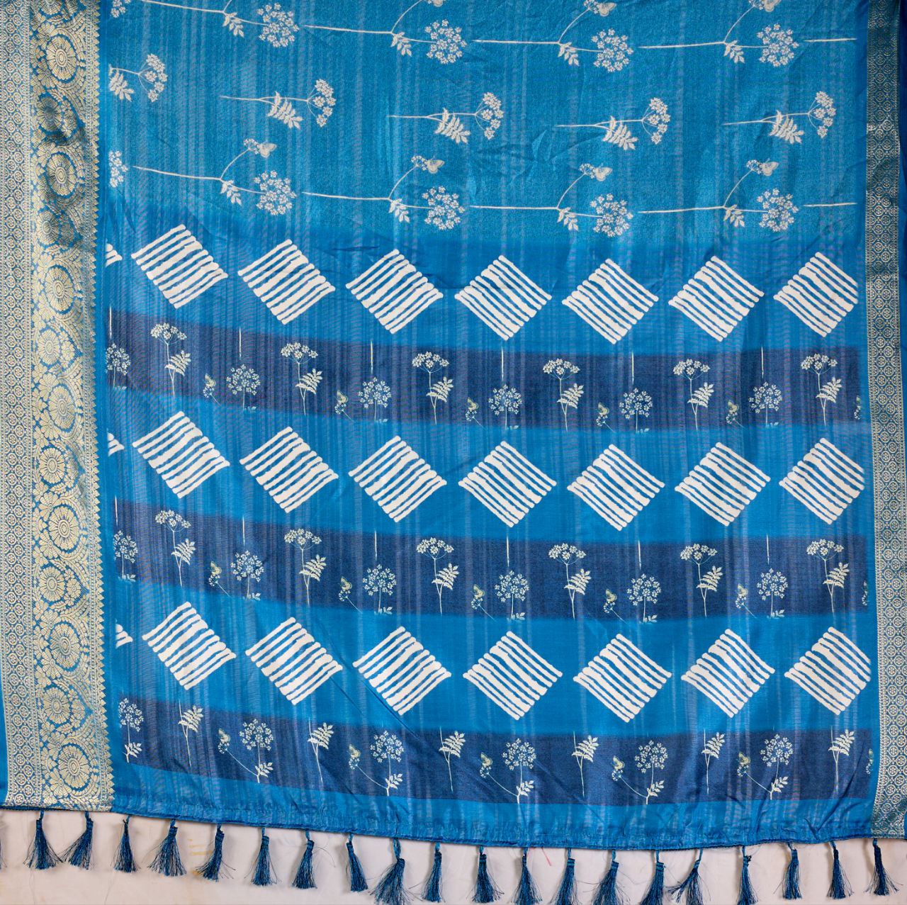 Premium Soft Lichi Silk Saree highlighted with graceful silver zari weaving and intricate ethnic motifs — radiating sheer elegance and royal charm in every drape.