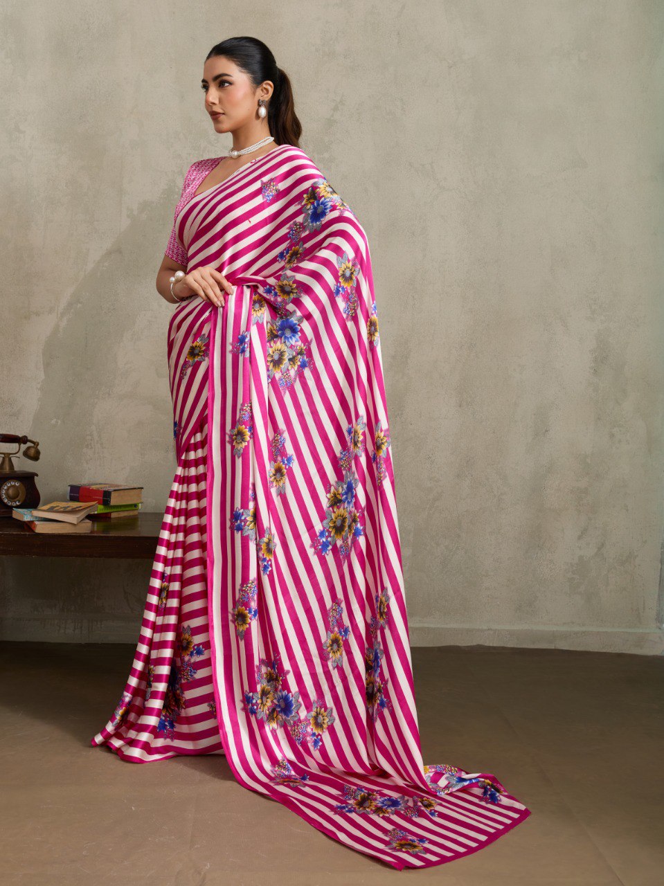 Pure Ajrakh modal satin fabric featuring traditional printed motifs with rich, earthy tones and a soft, breathable feel, perfect for all-day elegance.
