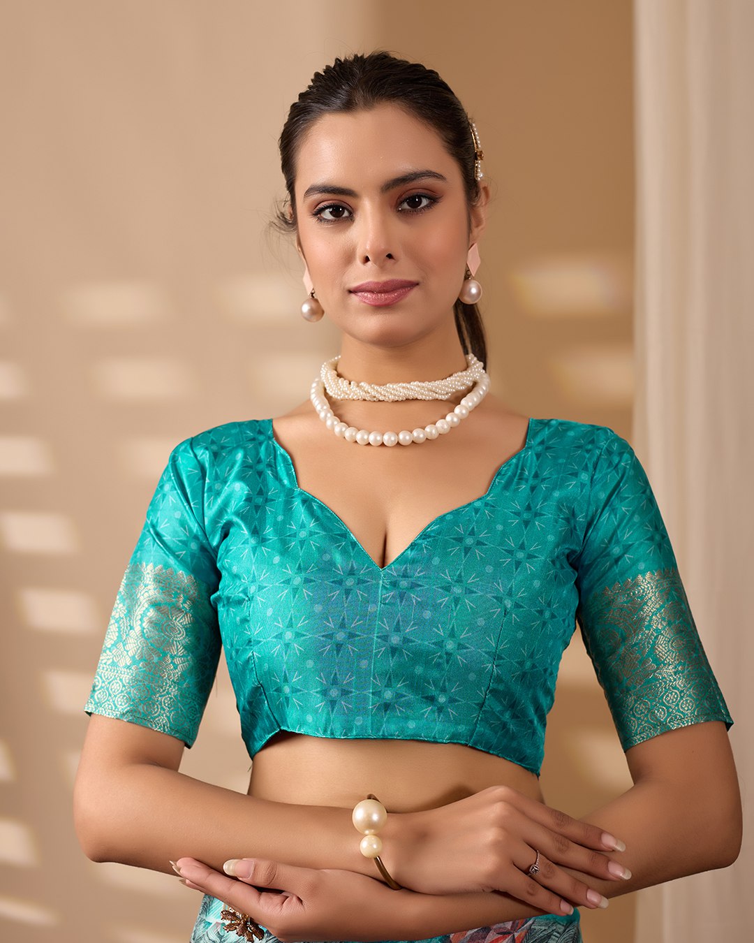 Premium Soft Lichi Silk Saree in Elegant Sea Green Shade, adorned with Artistic Abstract & Floral Digital Prints and enriched with a Luxurious Golden Zari Woven Border — a perfect blend of tradition and trend for festive & party occasions.