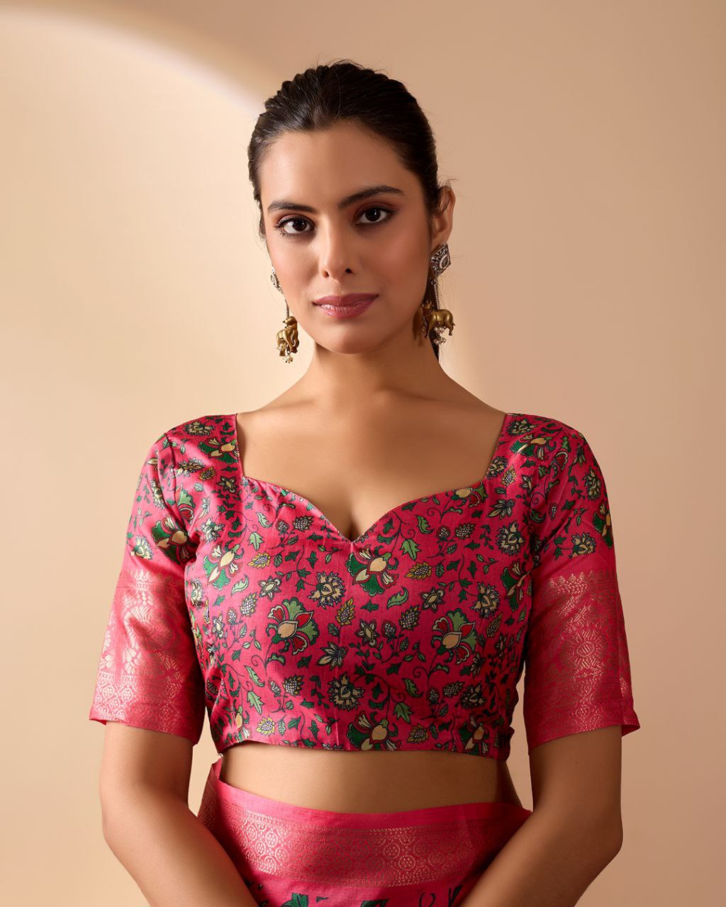 oft Lichi Silk Saree enriched with vibrant floral digital prints and a beautifully woven zari border.
