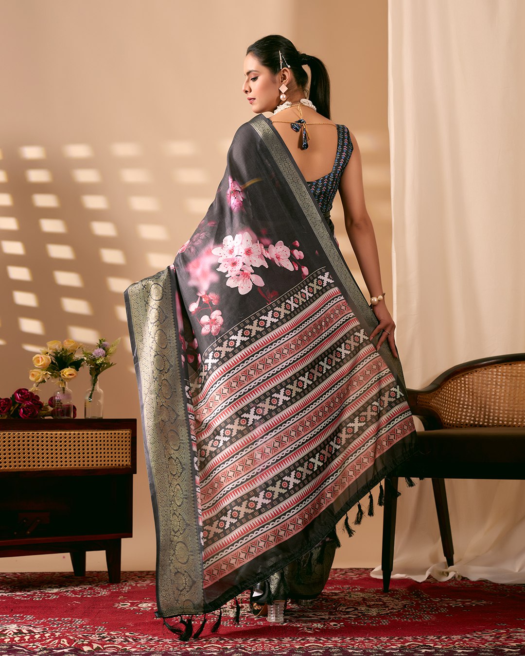 Stunning Soft Lichi Silk Saree featuring digital floral artistry on a deep elegant base with a rich golden zari border.