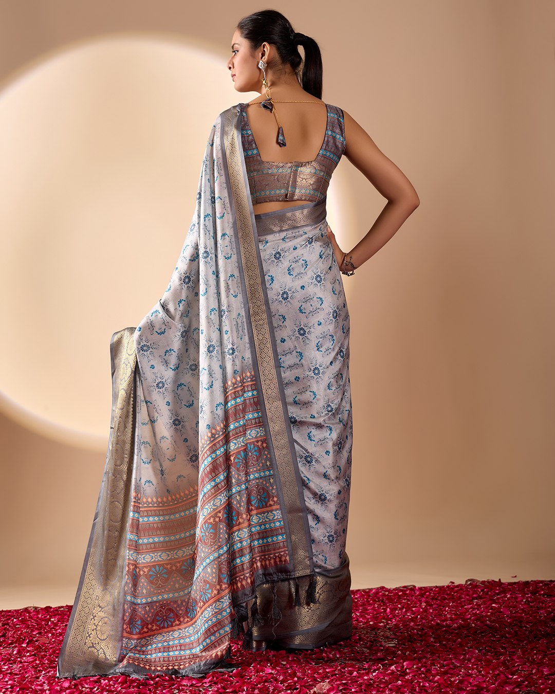 Premium Soft Lichi Silk Saree in Elegant Sea Green Shade, adorned with Artistic Abstract & Floral Digital Prints and enriched with a Luxurious Golden Zari Woven Border