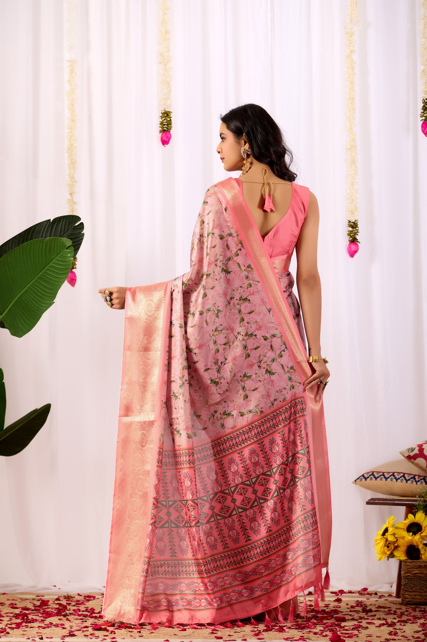 Premium Soft Lichi Silk Saree with a delicate floral print and a rich zari woven border, perfectly blending traditional elegance with modern grace.