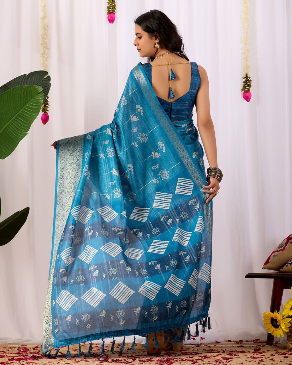 Premium Soft Lichi Silk Saree highlighted with graceful silver zari weaving and intricate ethnic motifs — radiating sheer elegance and royal charm in every drape.