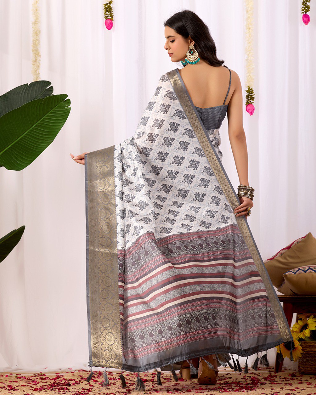 Premium Soft Lichi Silk Saree in Elegant White Base featuring intricate black ethnic motifs, beautifully complemented with a luxurious golden zari woven border and a rich maroon pallu