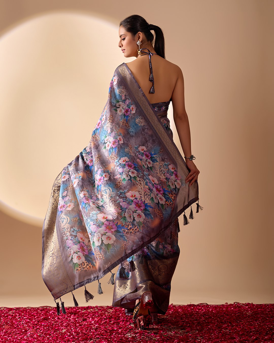 Gorgeous Soft Lichi Silk Saree featuring enchanting digital floral prints on a rich smoky grey base with an intricate golden zari border.