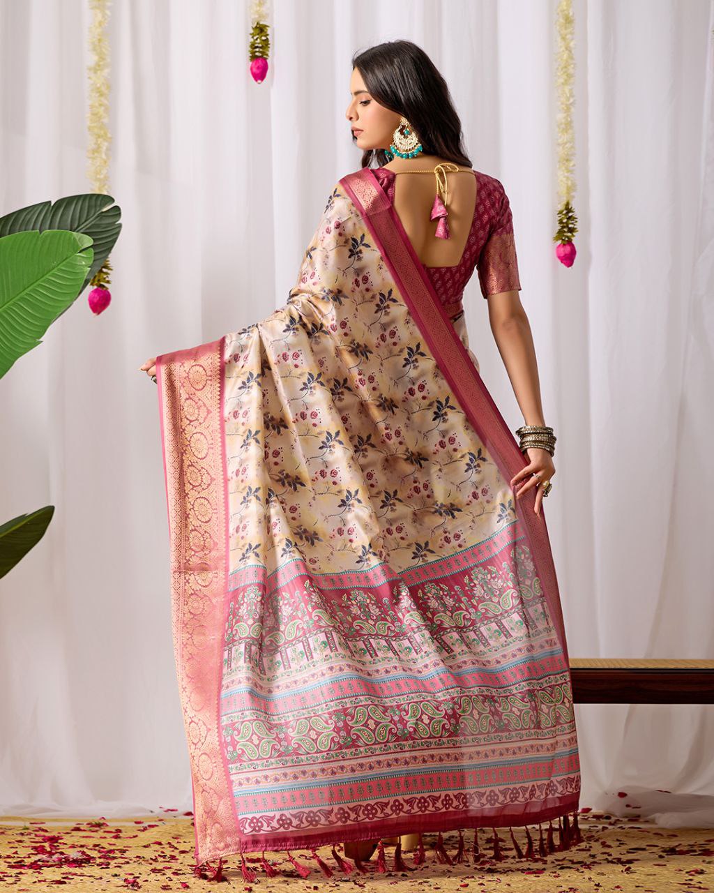 Premium Soft Lichi Silk Saree featuring mesmerizing floral digital prints beautifully enhanced with an elegant contrast zari woven border.