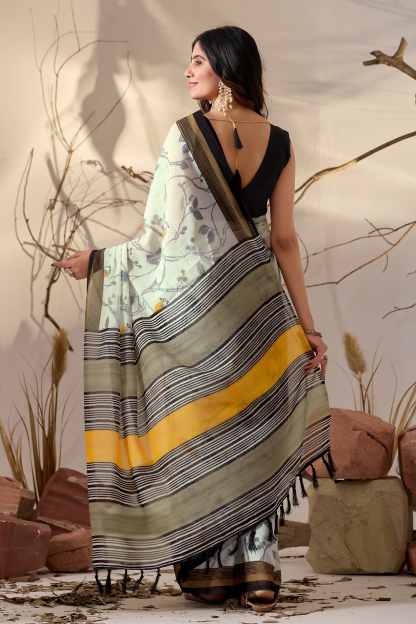 Soft Georgette Lightweight Saree with Delicate Cream Base, Adorned with Subtle Bird & Branch Motifs and Finished with Bold Mustard-Yellow & Black Striped Digital Print Border and Pallu with Elegant Tassel Detailing