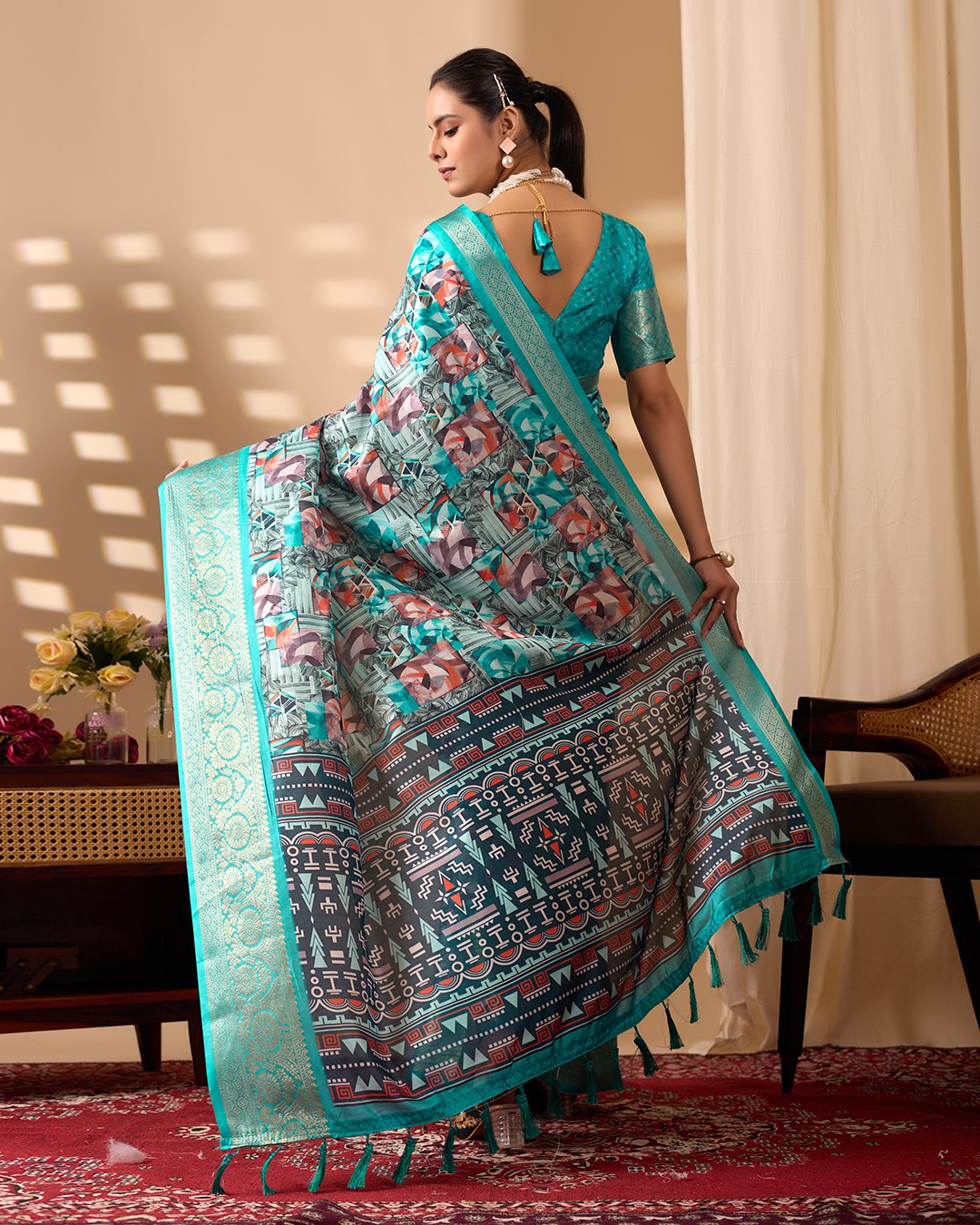 Premium Soft Lichi Silk Saree in Elegant Sea Green Shade, adorned with Artistic Abstract & Floral Digital Prints and enriched with a Luxurious Golden Zari Woven Border — a perfect blend of tradition and trend for festive & party occasions.