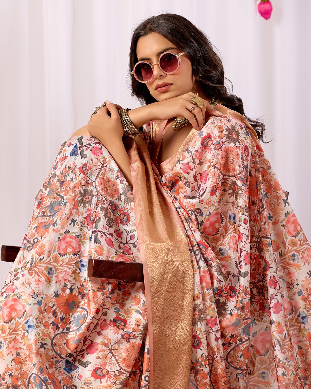 Premium Soft Lichi Silk Saree adorned with intricate floral digital weaving and luxurious golden zari border — blending timeless charm with regal grace.