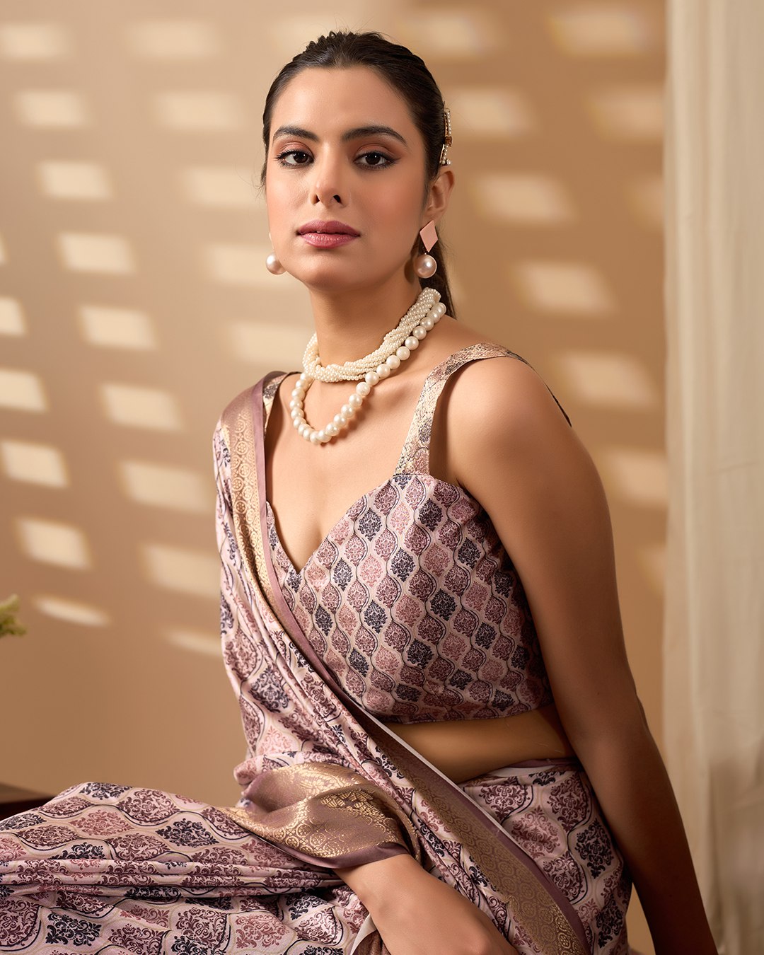 Elegant Soft Lichi Silk Saree beautifully crafted with intricate digital weaving patterns and a rich golden zari border