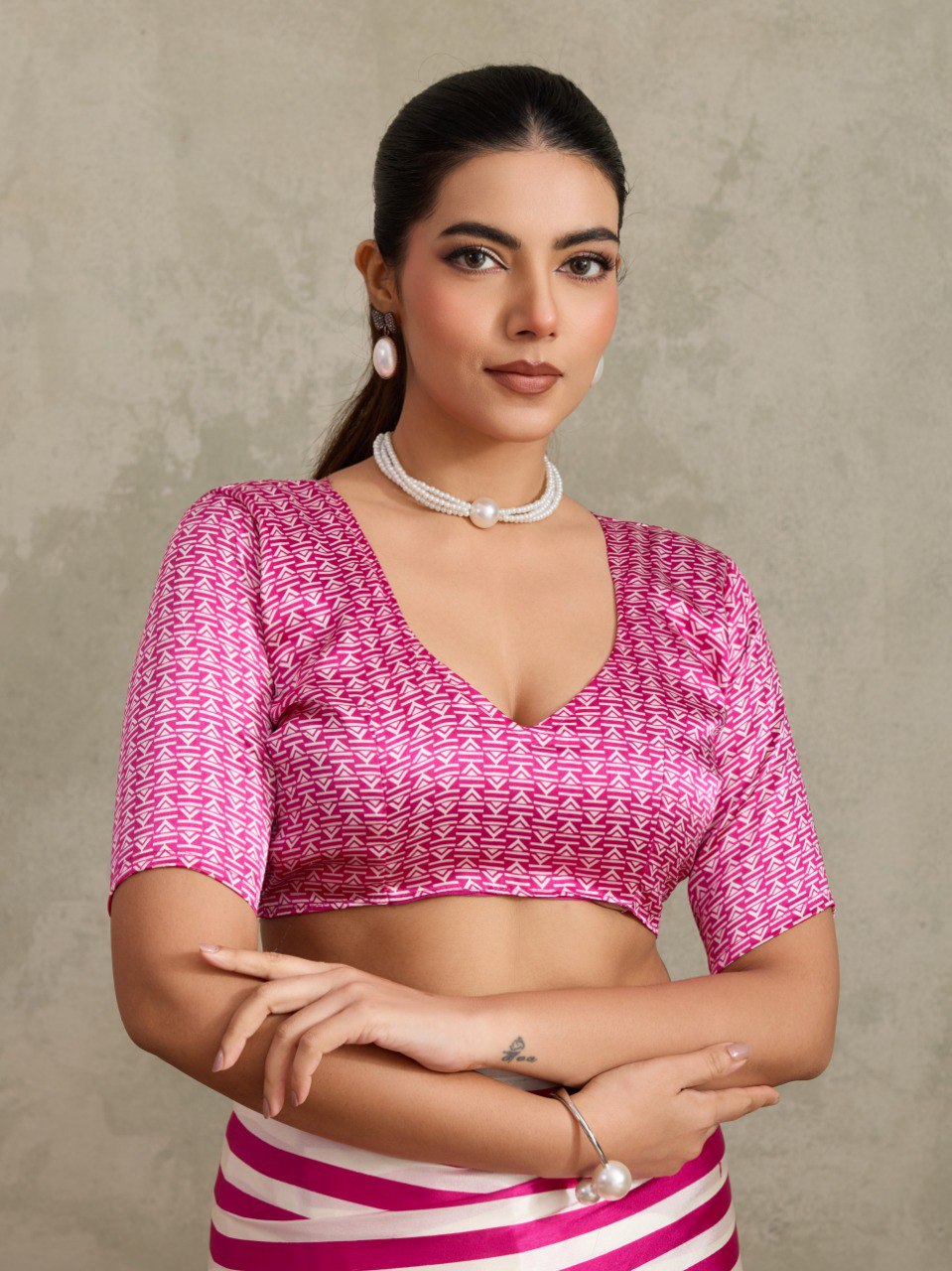 Pure Ajrakh modal satin fabric featuring traditional printed motifs with rich, earthy tones and a soft, breathable feel, perfect for all-day elegance.