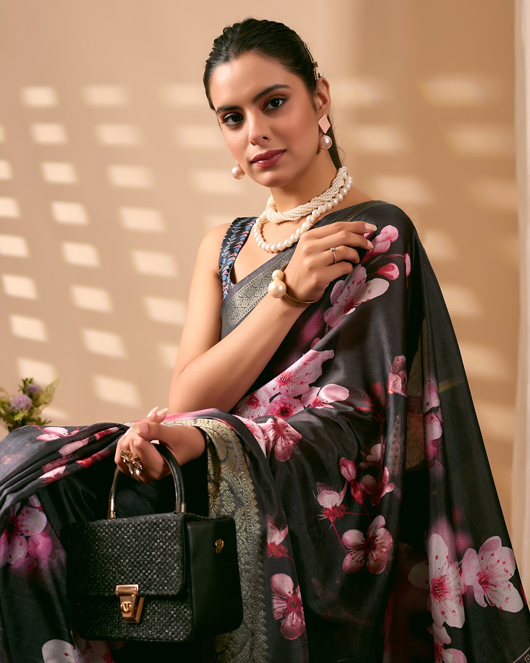 Stunning Soft Lichi Silk Saree featuring digital floral artistry on a deep elegant base with a rich golden zari border.