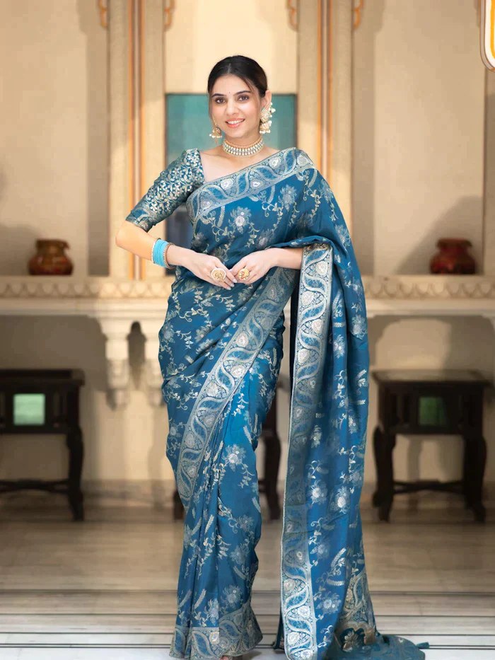 The richly crafted border and opulent pallu showcase traditional Banarasi Silk sarees