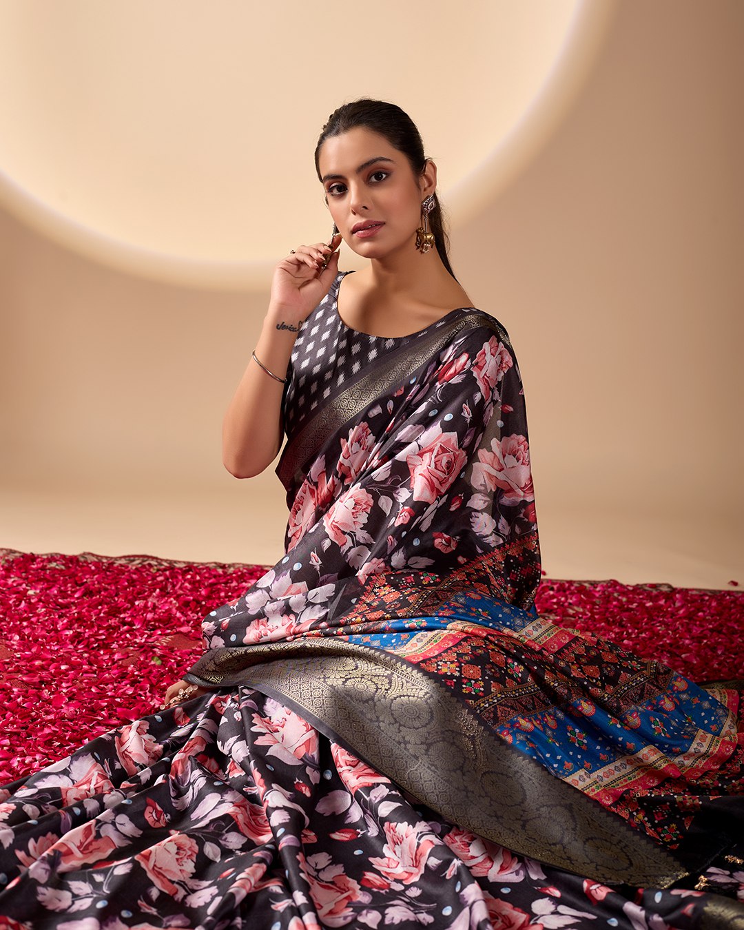 Premium Soft Lichi Silk Saree in Rich Black Tone, adorned with Artistic Floral Prints and a Vibrant Traditional Multicolor Pallu.
