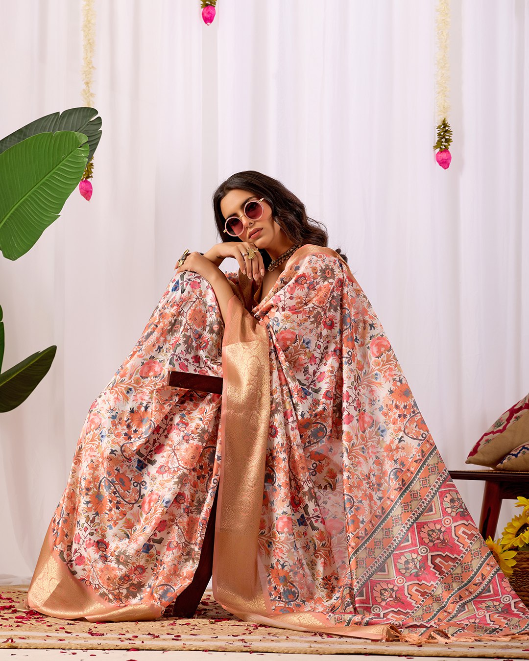 Premium Soft Lichi Silk Saree adorned with intricate floral digital weaving and luxurious golden zari border — blending timeless charm with regal grace.