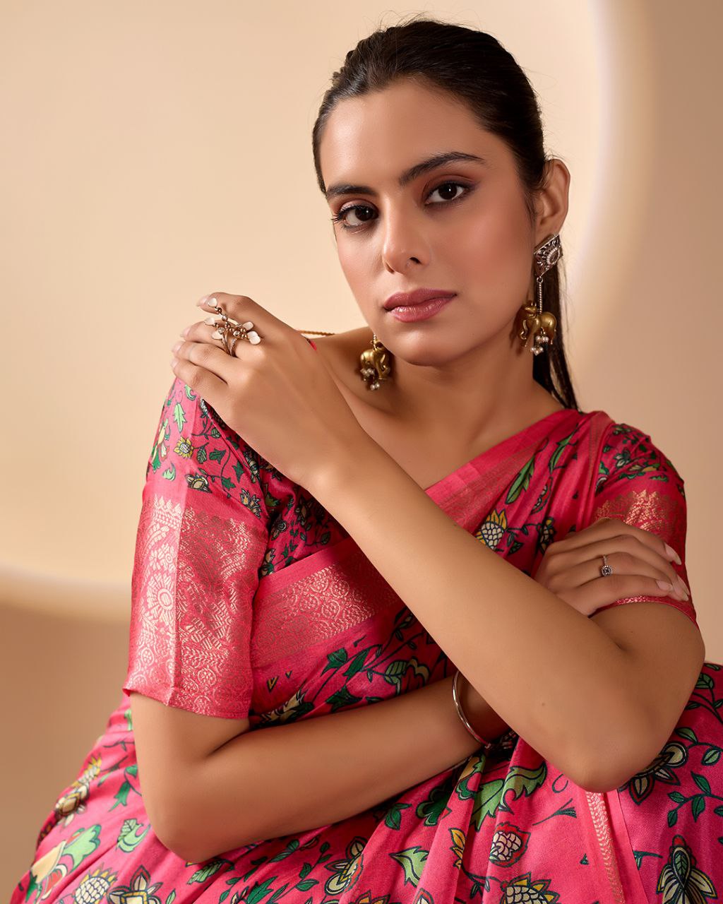oft Lichi Silk Saree enriched with vibrant floral digital prints and a beautifully woven zari border.