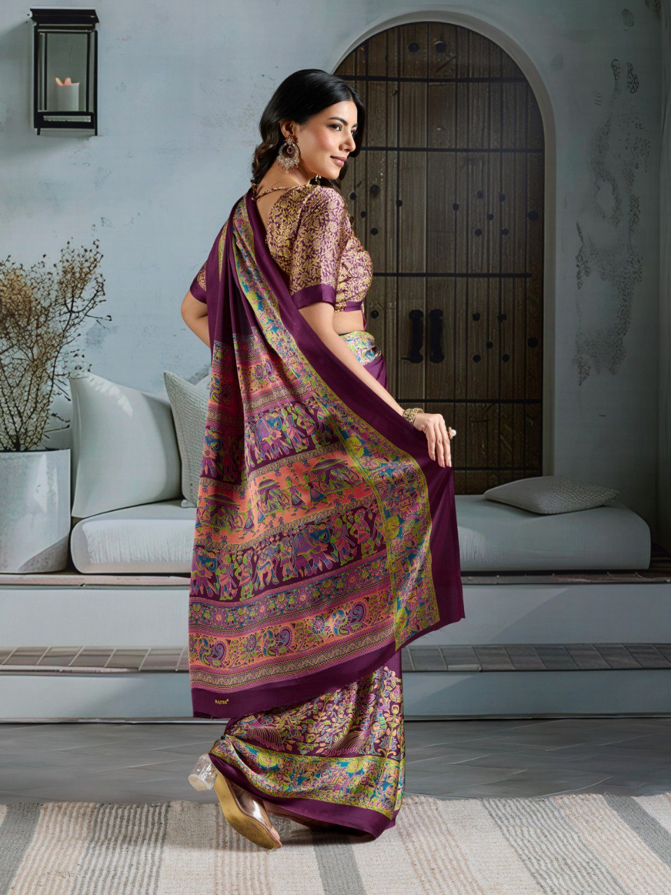 Pure Ajrakh modal satin fabric featuring traditional printed motifs with rich, earthy tones and a soft, breathable feel, perfect for all-day elegance.