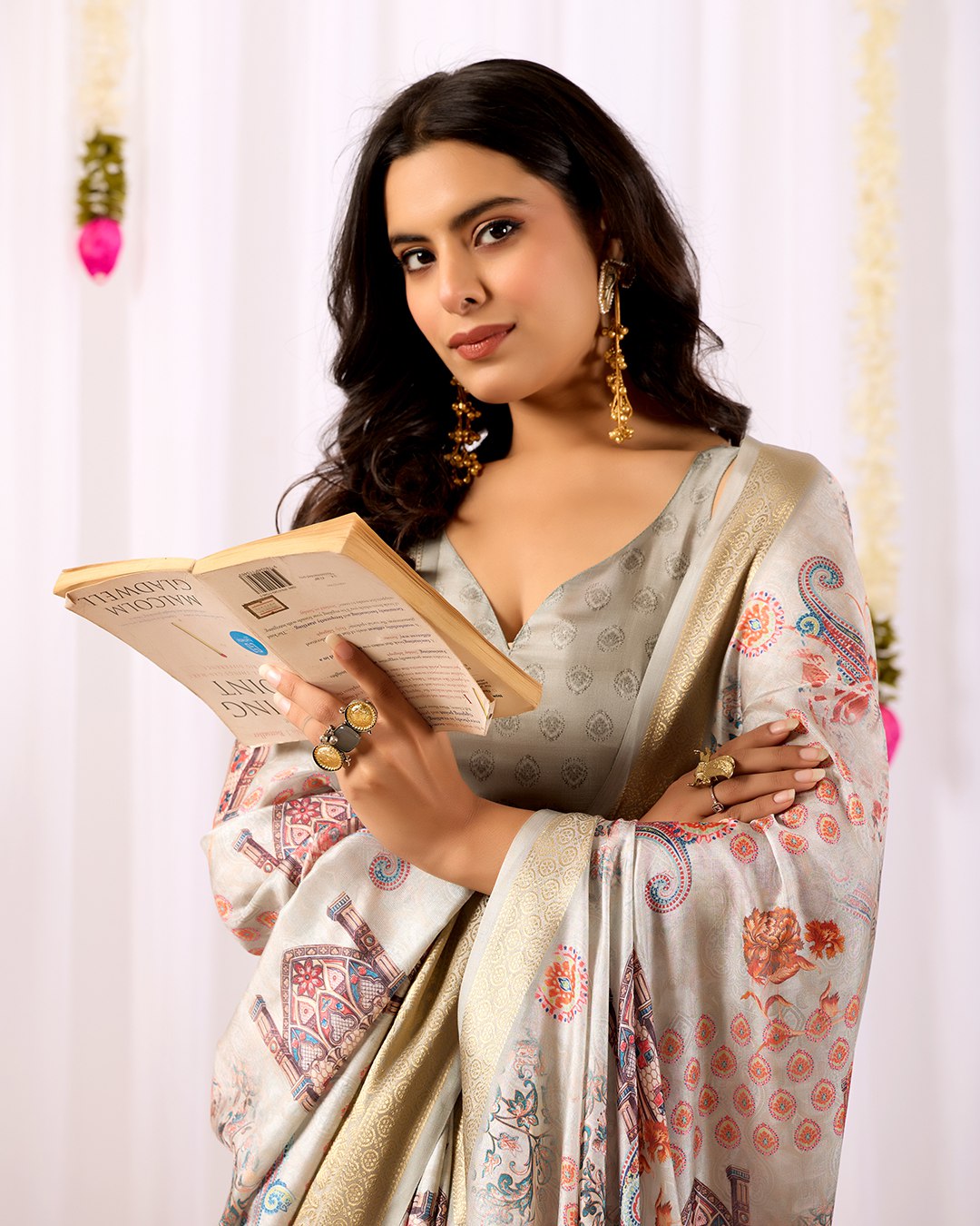 Elegant Soft Lichi Silk Saree featuring royal ethnic motifs with a lavish golden zari woven border, bringing together rich heritage and modern sophistication.