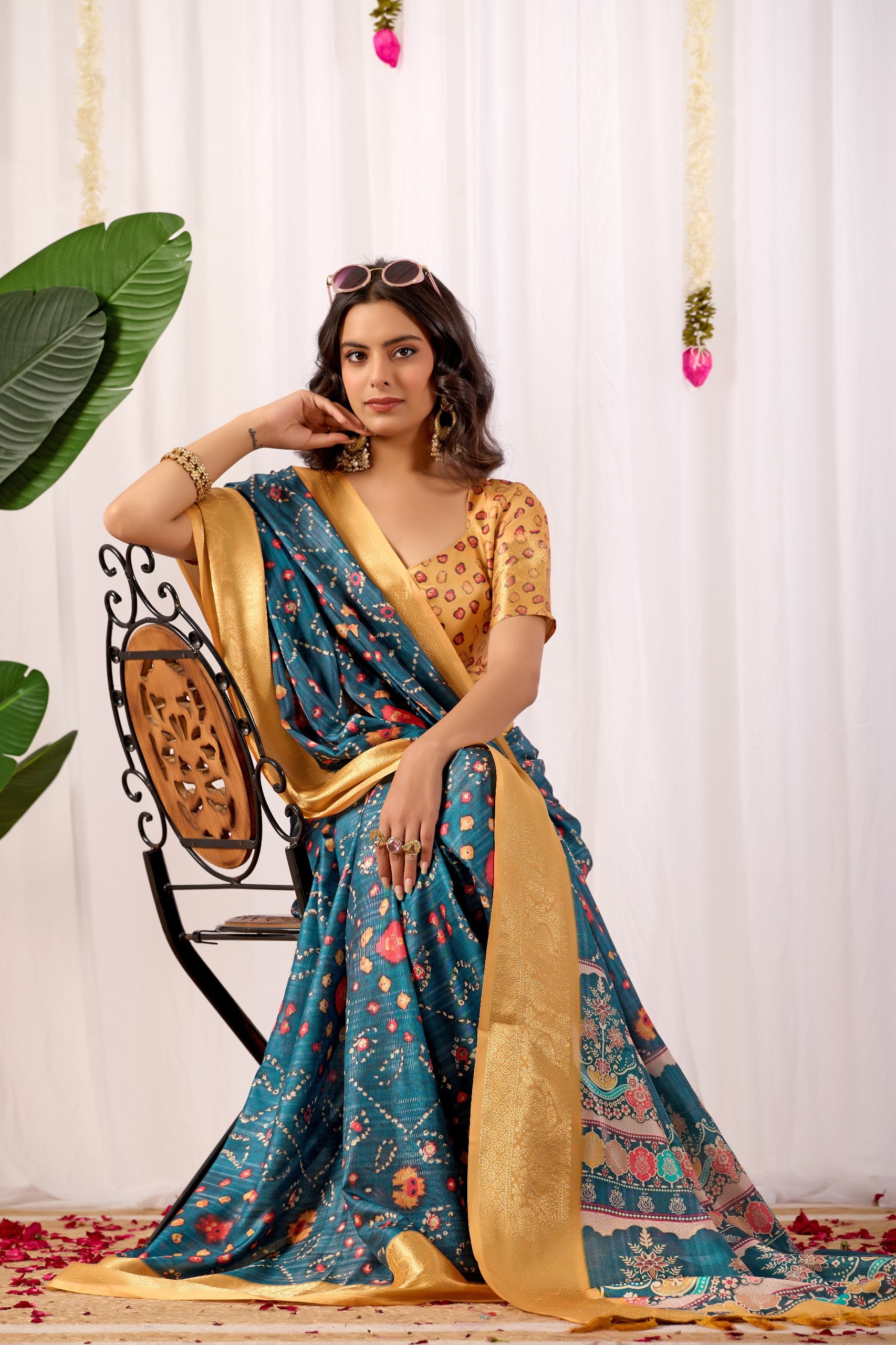 Soft Lichi Silk Saree featuring an Elegant Tribal Art Print complemented by a Luxurious Rich Zari Border. The blend of traditional artistry and silky sheen adds a royal touch to your festive look.