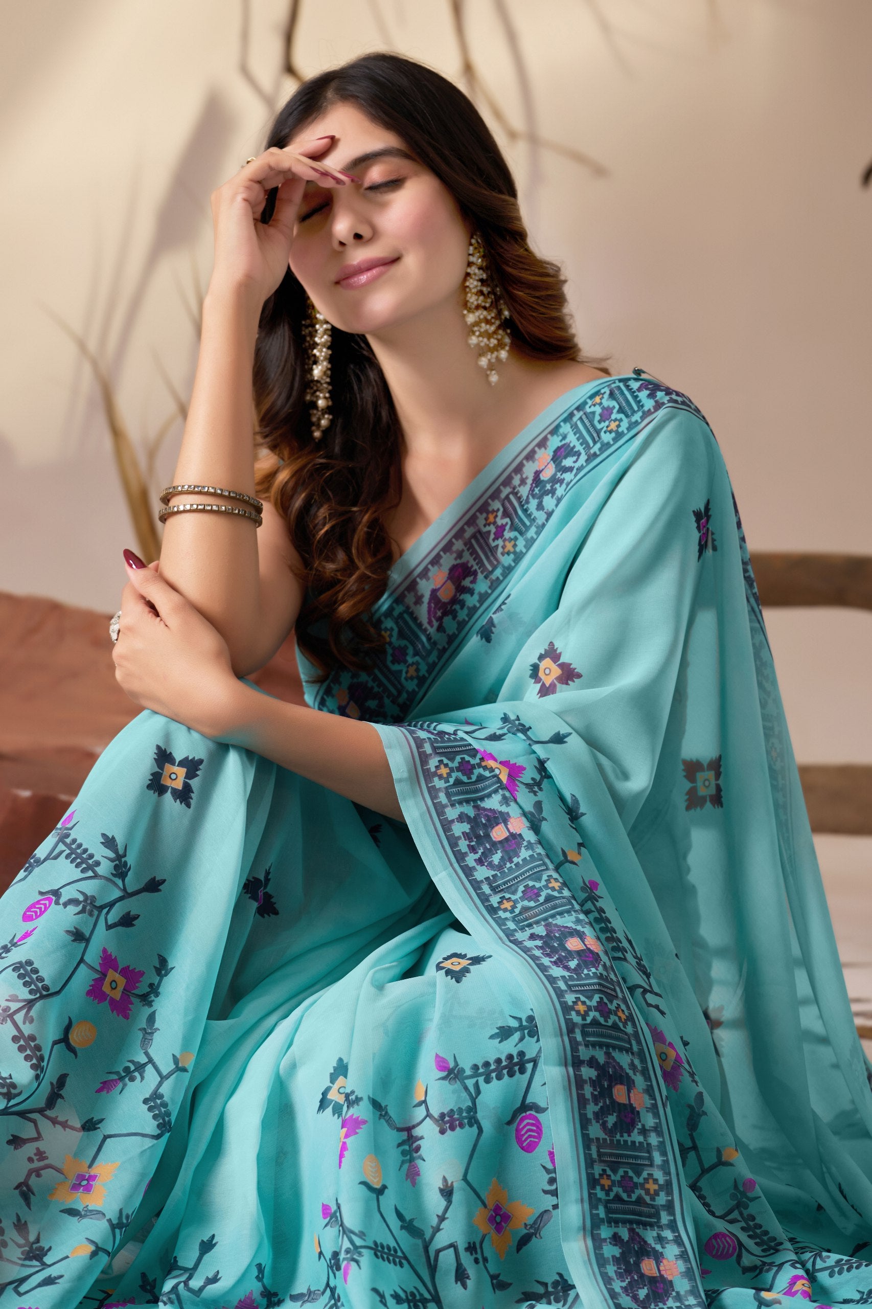 Soft Georgette Saree in Refreshing Sea Green Tone Highlighted with Intricate Digital Tribal & Floral Print, Featuring Artistic Elephant & Geometric Motifs with Elegant Tassel Detailing on Pallu