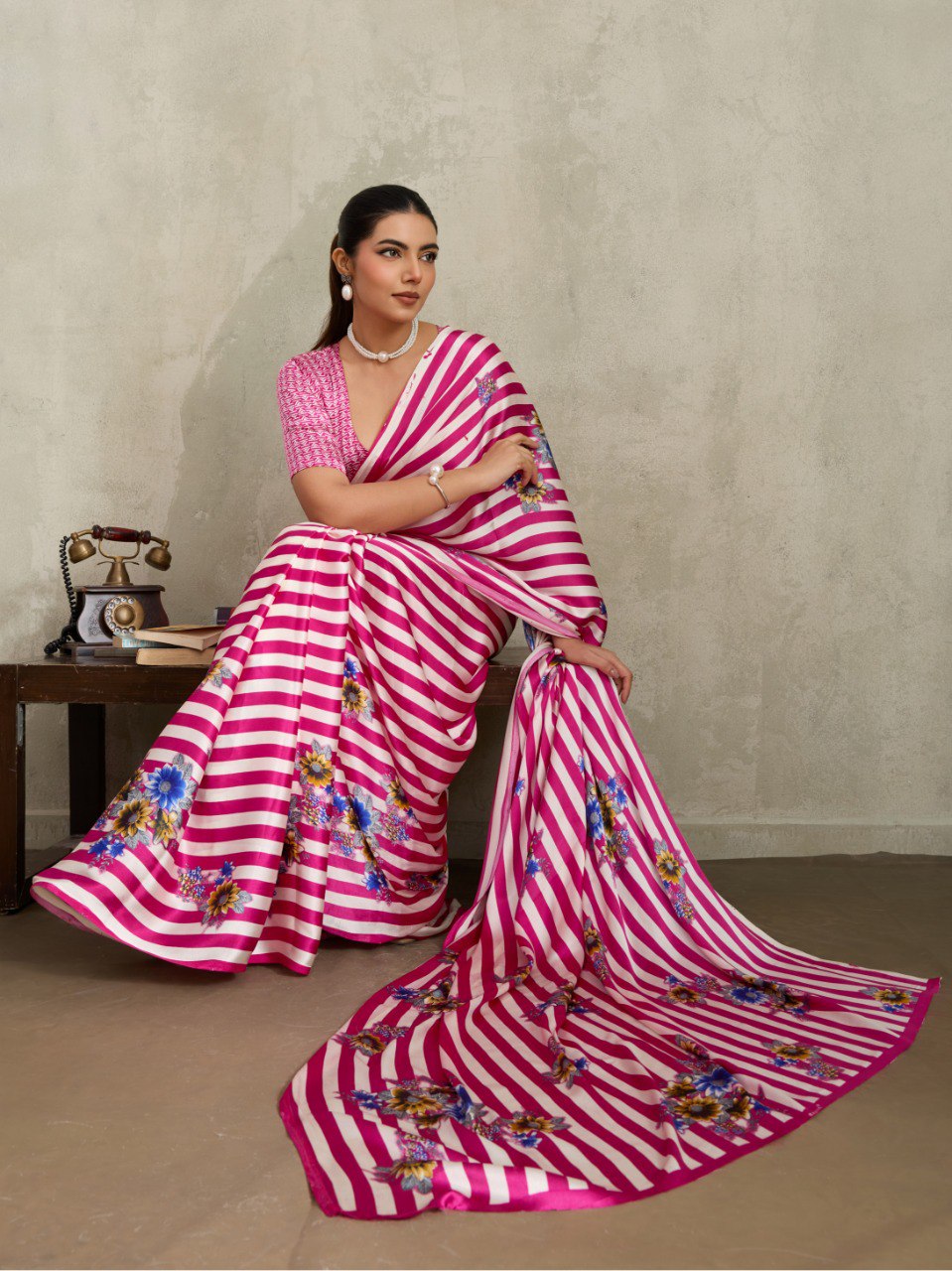 Pure Ajrakh modal satin fabric featuring traditional printed motifs with rich, earthy tones and a soft, breathable feel, perfect for all-day elegance.