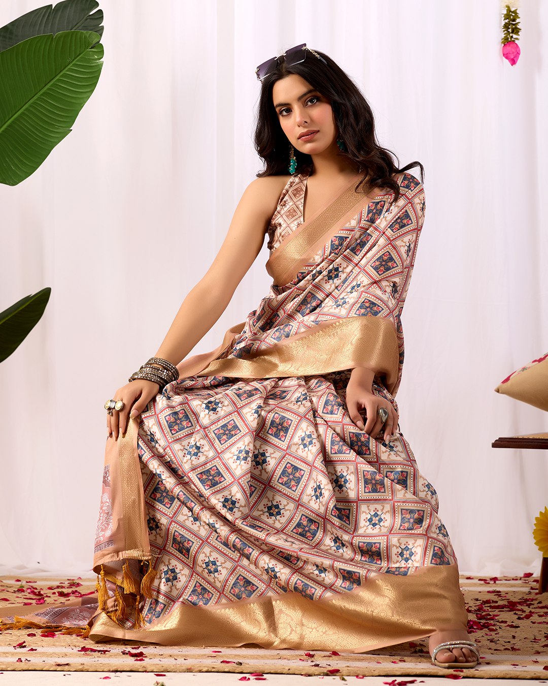 Premium Soft Lichi Silk Saree featuring elegant traditional geometric patterns, beautifully enhanced with a luxurious golden zari woven border — a graceful choice for every festive or formal occasion.
