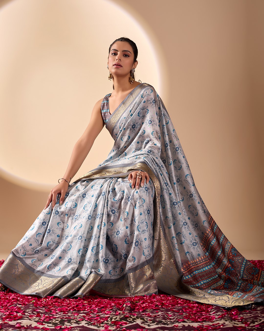 Premium Soft Lichi Silk Saree in Elegant Sea Green Shade, adorned with Artistic Abstract & Floral Digital Prints and enriched with a Luxurious Golden Zari Woven Border