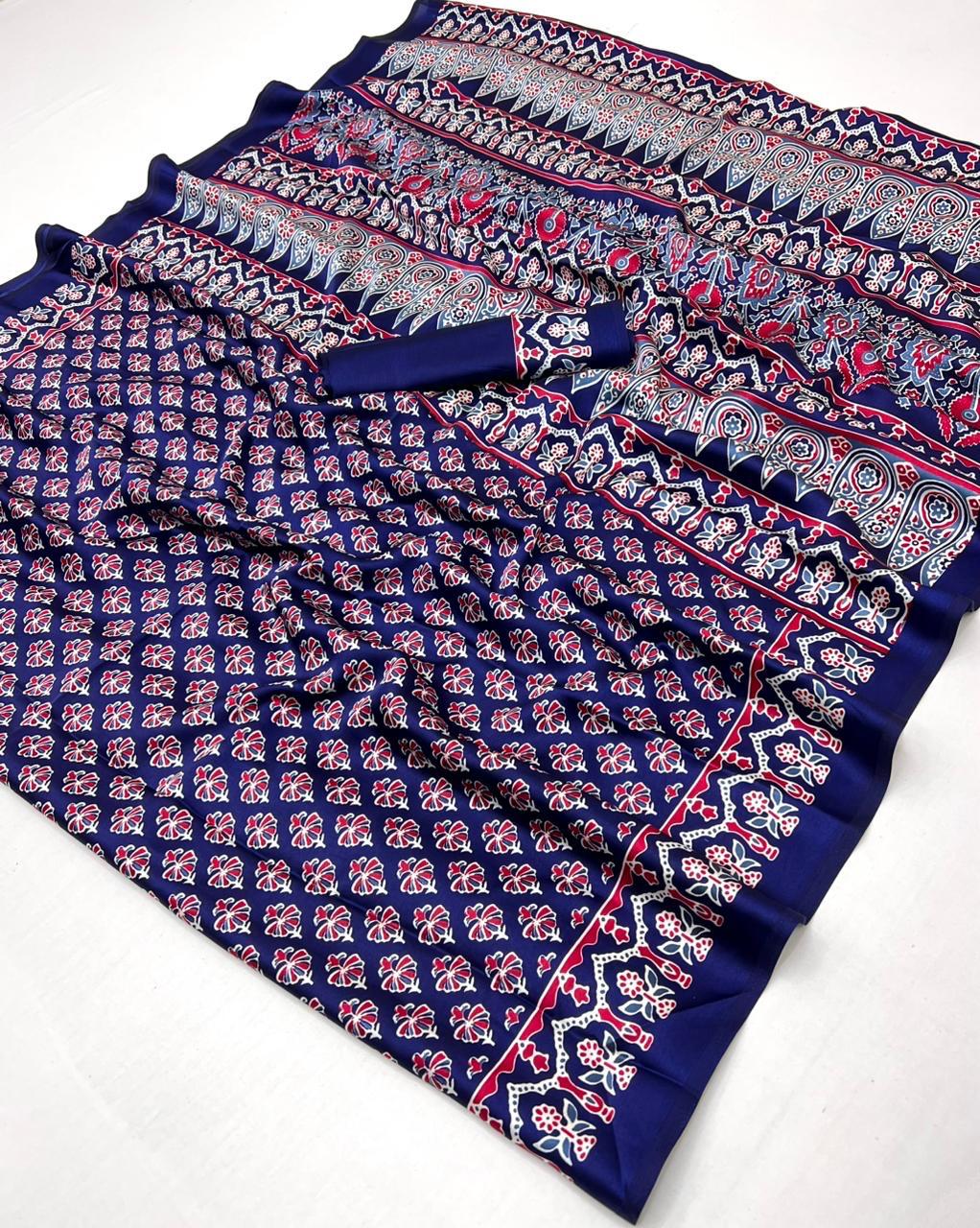 Pure Ajrakh modal satin fabric featuring traditional printed motifs with rich, earthy tones and a soft, breathable feel, perfect for all-day elegance.