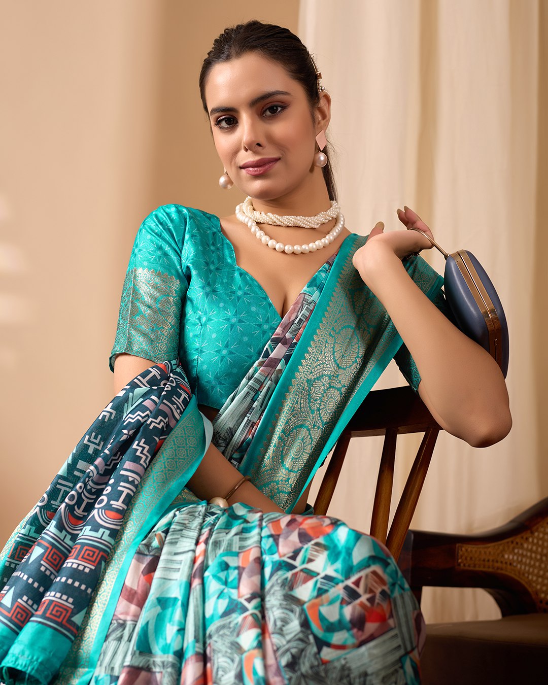 Premium Soft Lichi Silk Saree in Elegant Sea Green Shade, adorned with Artistic Abstract & Floral Digital Prints and enriched with a Luxurious Golden Zari Woven Border — a perfect blend of tradition and trend for festive & party occasions.