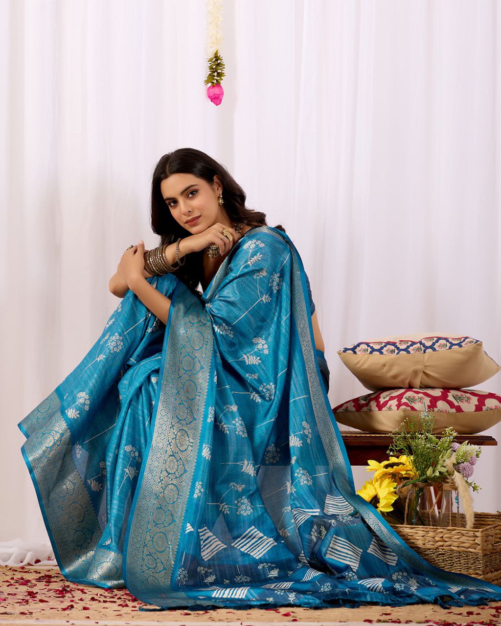 Premium Soft Lichi Silk Saree highlighted with graceful silver zari weaving and intricate ethnic motifs — radiating sheer elegance and royal charm in every drape.