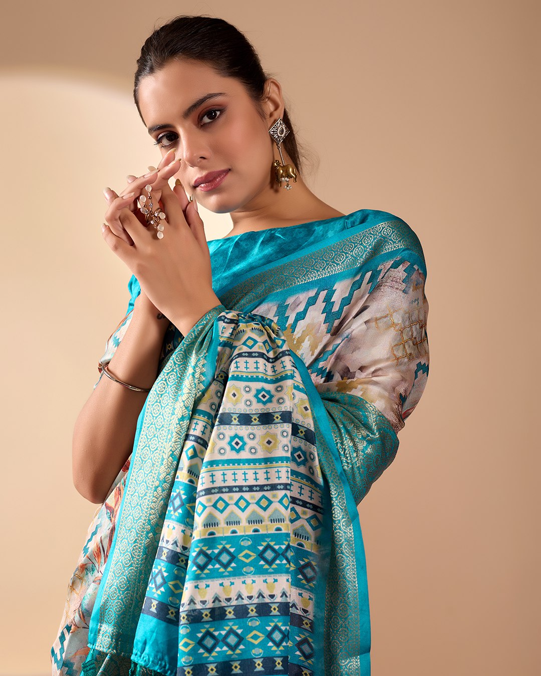 Soft Lichi Silk Saree featuring an Exquisite Combination of Modern Digital Print and Rich Traditional Zari Woven Border.