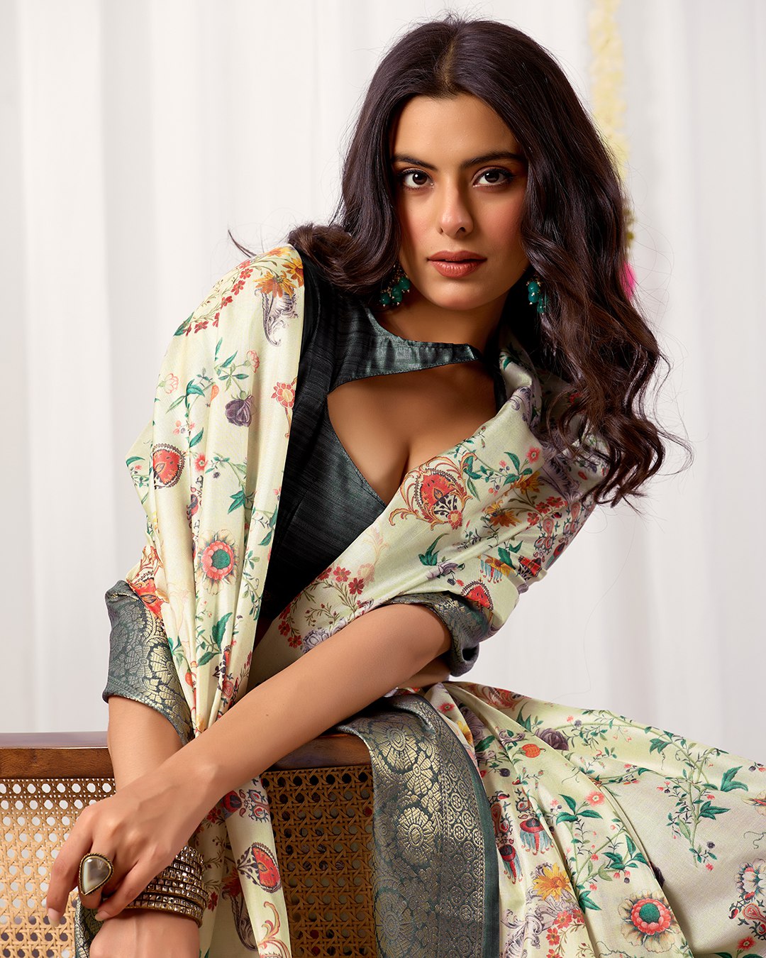 Premium Soft Lichi Silk Saree adorned with vibrant digital floral prints, complemented by a rich, intricately woven zari border — a perfect blend of luxury and tradition.