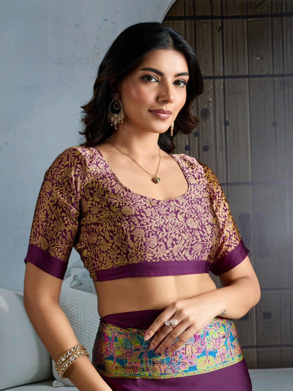 Pure Ajrakh modal satin fabric featuring traditional printed motifs with rich, earthy tones and a soft, breathable feel, perfect for all-day elegance.