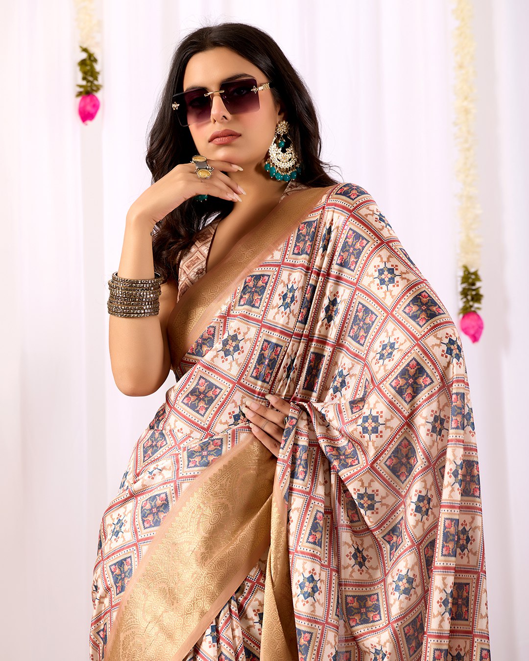 Premium Soft Lichi Silk Saree featuring elegant traditional geometric patterns, beautifully enhanced with a luxurious golden zari woven border — a graceful choice for every festive or formal occasion.