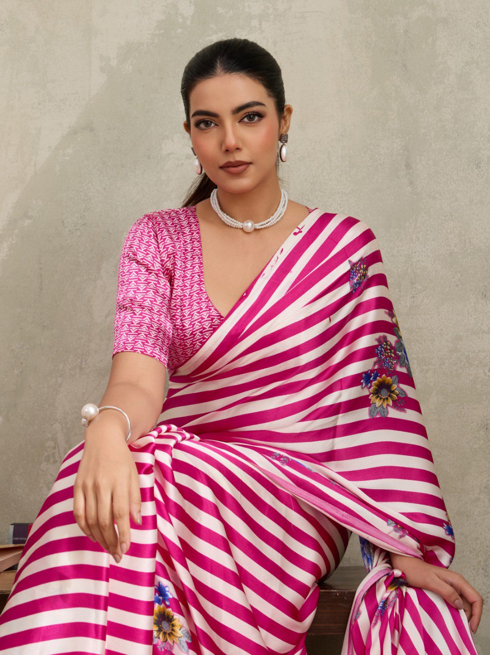 Pure Ajrakh modal satin fabric featuring traditional printed motifs with rich, earthy tones and a soft, breathable feel, perfect for all-day elegance.