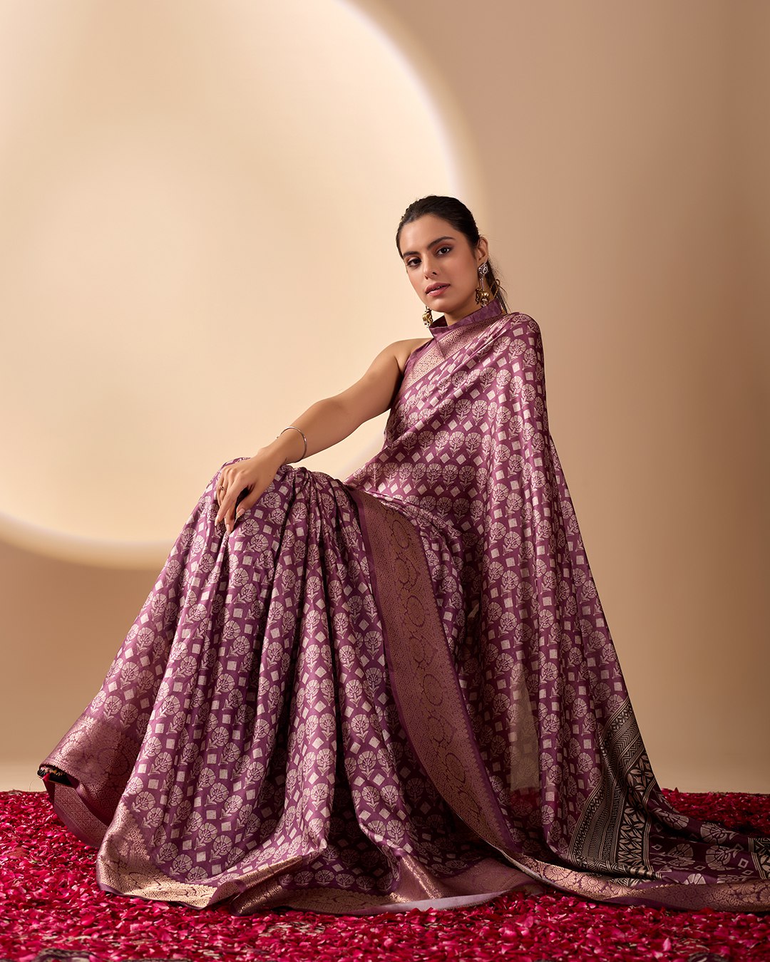 Regal Soft Lichi Silk Saree adorned with intricate digital ethnic weaving motifs and a luxurious golden zari border.