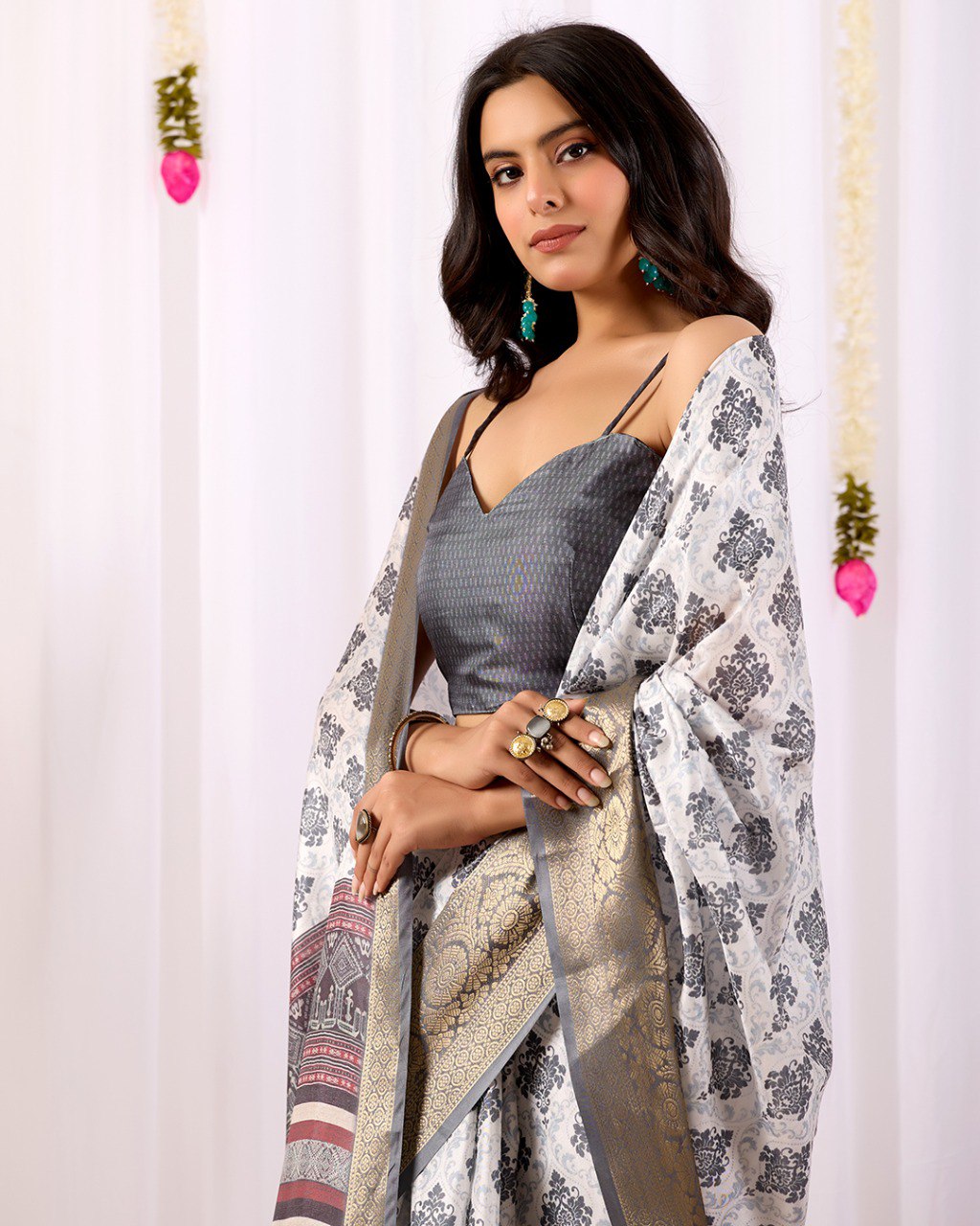Premium Soft Lichi Silk Saree in Elegant White Base featuring intricate black ethnic motifs, beautifully complemented with a luxurious golden zari woven border and a rich maroon pallu